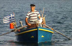 makrygialos-fisherman_and_barka_sea